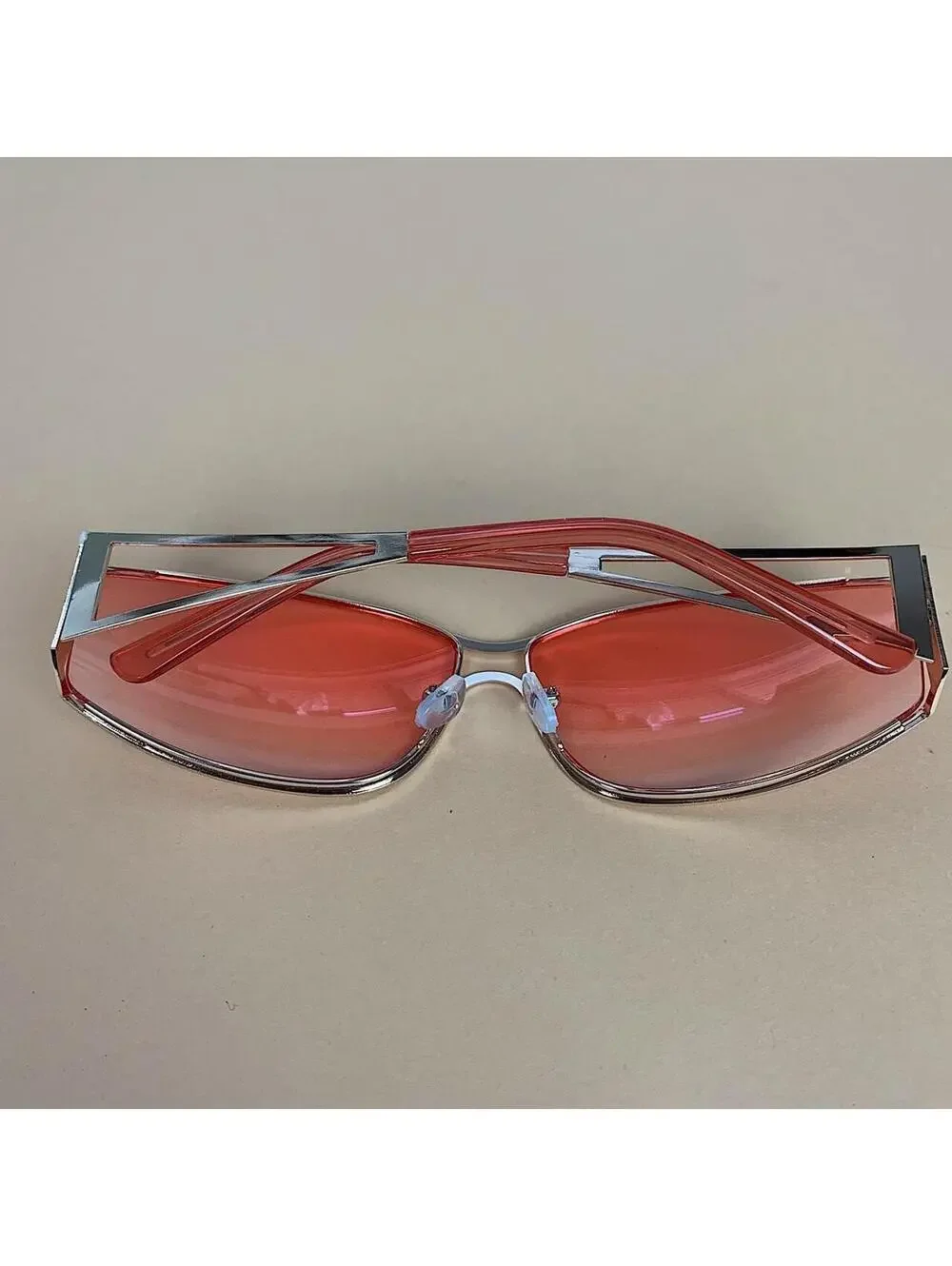 Vintage y2k 2000s classy pink chrome trim sunglasses. Chrome trim pink lenses